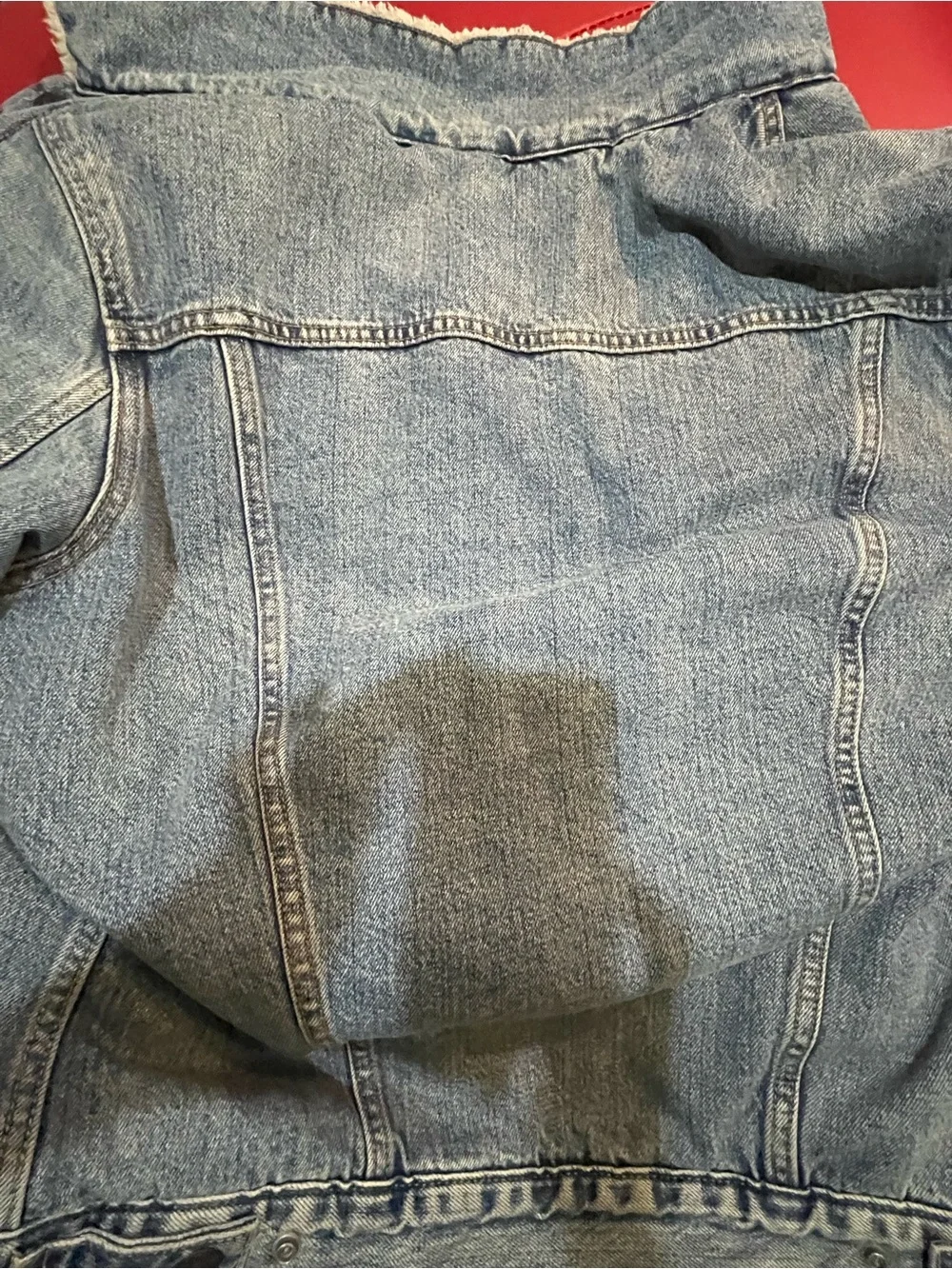 Levi's Light Blue Denim Trucker Jacket with Cream Sherpa Lining
